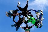 Experienced jumpers enjoying free fall at the skydiving company